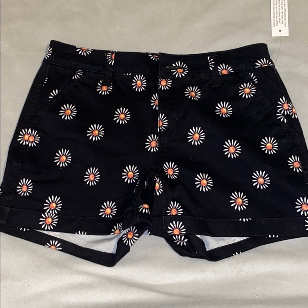 Black shorts with sunflowers